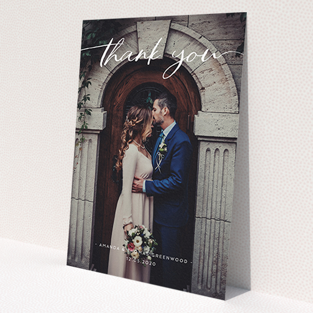 A photo wedding thank you card named 'Topped and Bottomed'. It is an A6 card in a portrait orientation. It is a photographic photo wedding thank you card with room for 1 photo. 'Topped and Bottomed' is available as a flat card, with mainly white colouring.