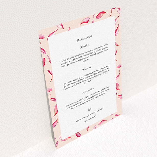 A wedding information sheet design named "Petal avalanche". It is an A6 card in a portrait orientation. "Petal avalanche" is available as a flat card, with tones of pink and dark pink.