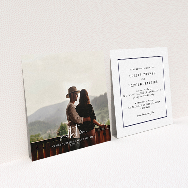 A wedding invite card named "Central Script". It is a square (148mm x 148mm) invite in a square orientation. It is a photographic wedding invite card with room for 1 photo. "Central Script" is available as a flat invite, with mainly white colouring.