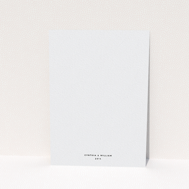 A wedding invite card design named "Newsreel". It is an A6 invite in a portrait orientation. It is a photographic wedding invite card with room for 3 photos. "Newsreel" is available as a flat invite, with tones of black and white.