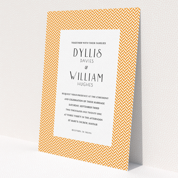 A wedding invite card called 'Orange Houndstooth'. It is an A5 invite in a portrait orientation. 'Orange Houndstooth' is available as a flat invite, with tones of orange and white.