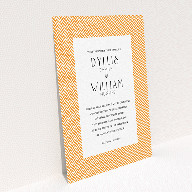 A wedding invite card called "Orange Houndstooth". It is an A5 invite in a portrait orientation. "Orange Houndstooth" is available as a flat invite, with tones of orange and white.