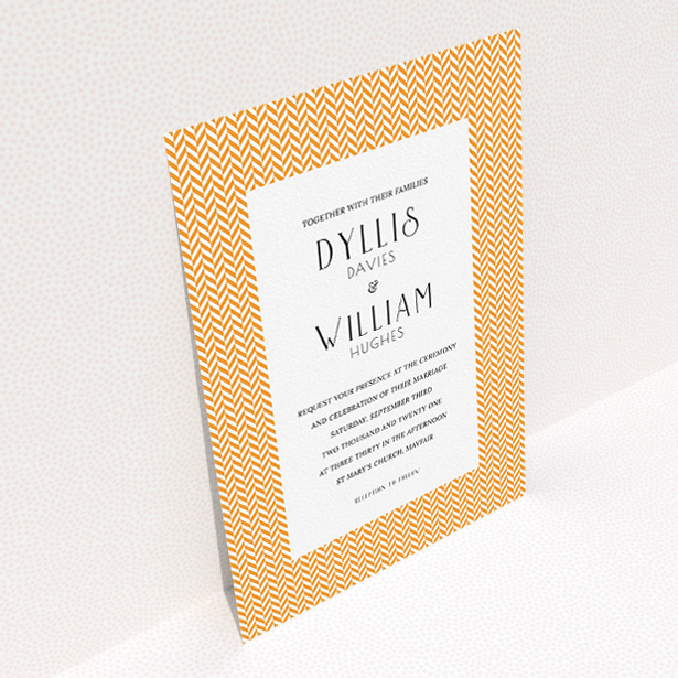 A wedding invite card called "Orange Houndstooth". It is an A5 invite in a portrait orientation. "Orange Houndstooth" is available as a flat invite, with tones of orange and white.