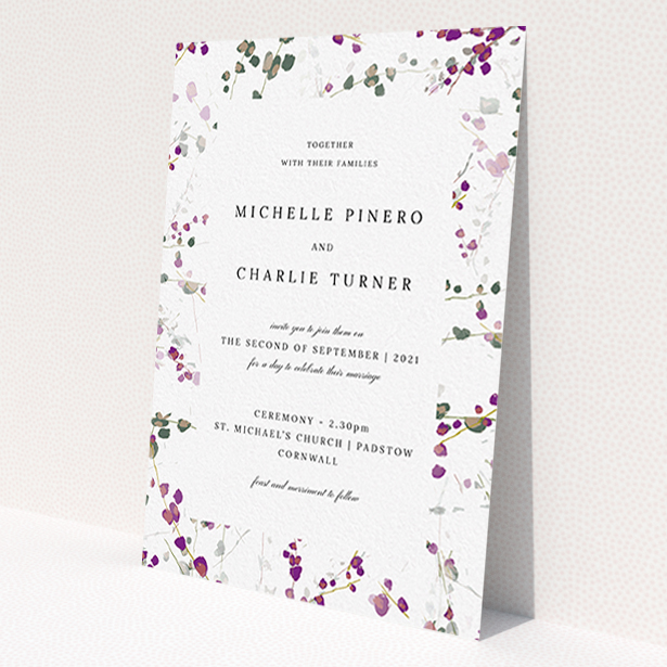 A wedding invite card named 'Purple Lupine'. It is an A6 invite in a portrait orientation. 'Purple Lupine' is available as a flat invite, with tones of purple, pink and dark green.