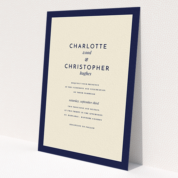 A wedding invite card named 'Script switch'. It is an A6 invite in a portrait orientation. 'Script switch' is available as a flat invite, with tones of cream and navy blue.