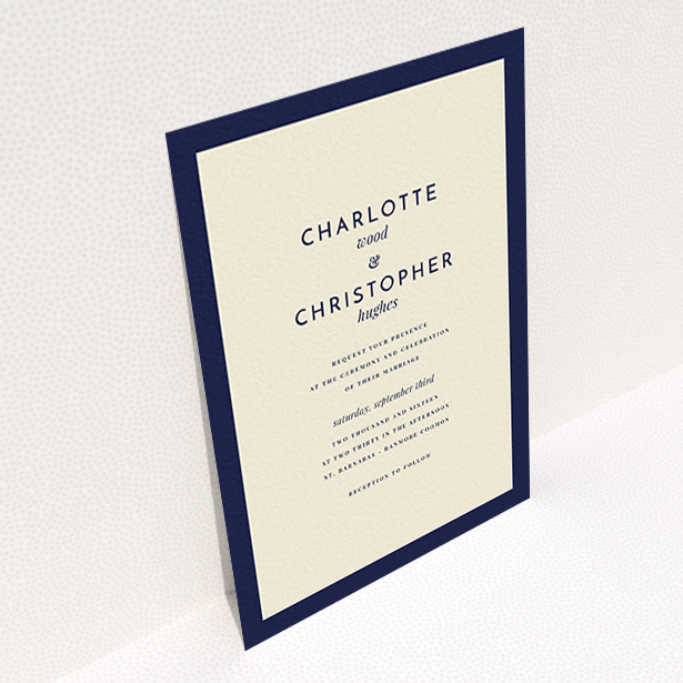 A wedding invite card named "Script switch". It is an A6 invite in a portrait orientation. "Script switch" is available as a flat invite, with tones of cream and navy blue.