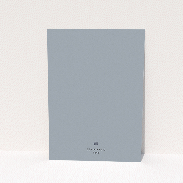 A wedding invite card named "Shaded sundial". It is an A6 invite in a portrait orientation. "Shaded sundial" is available as a flat invite, with tones of dark grey and navy blue.