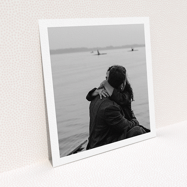 A wedding invite card design called "Thick White Framed Photo". It is a square (148mm x 148mm) invite in a square orientation. It is a photographic wedding invite card with room for 1 photo. "Thick White Framed Photo" is available as a flat invite.