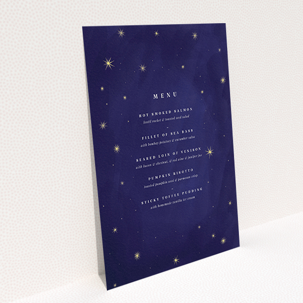 A wedding menu card design called "Sky at night". It is an A6 menu in a portrait orientation. "Sky at night" is available as a flat menu, with tones of blue and gold.
