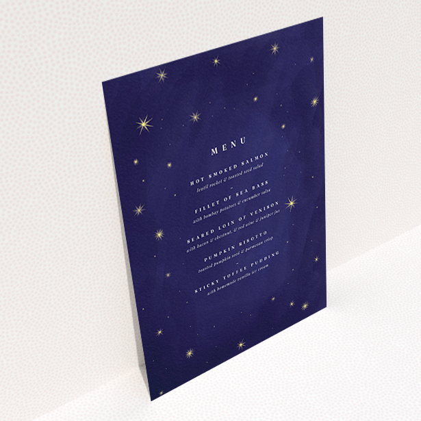 A wedding menu card design called "Sky at night". It is an A6 menu in a portrait orientation. "Sky at night" is available as a flat menu, with tones of blue and gold.