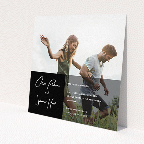A wedding save the date called 'Black on black'. It is a square (148mm x 148mm) save the date in a square orientation. It is a photographic wedding save the date with room for 1 photo. 'Black on black' is available as a flat save the date, with tones of black and white.