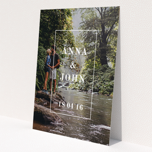 A wedding save the date card named "Just us portrait". It is an A5 card in a portrait orientation. It is a photographic wedding save the date card with room for 1 photo. "Just us portrait" is available as a flat card, with mainly white colouring.