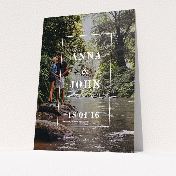 A wedding save the date card named "Just us portrait". It is an A5 card in a portrait orientation. It is a photographic wedding save the date card with room for 1 photo. "Just us portrait" is available as a flat card, with mainly white colouring.