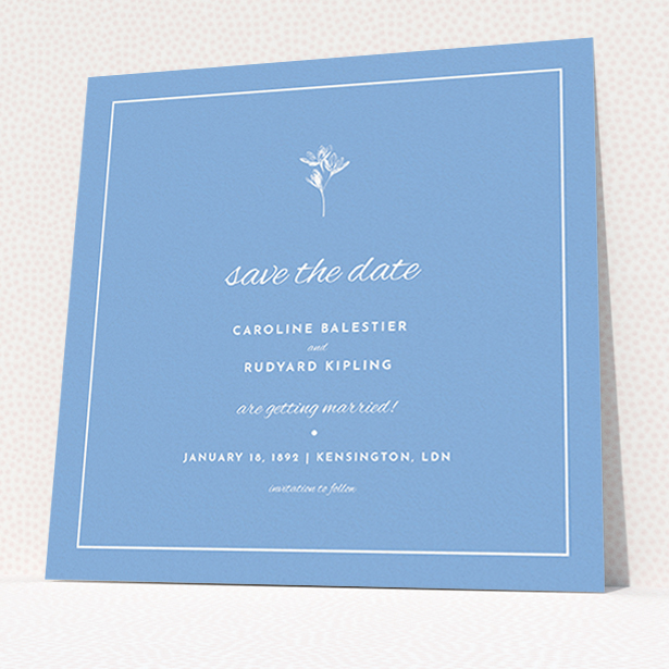 A wedding save the date card design called "My little daisy". It is a square (148mm x 148mm) card in a square orientation. "My little daisy" is available as a flat card, with tones of blue and white.