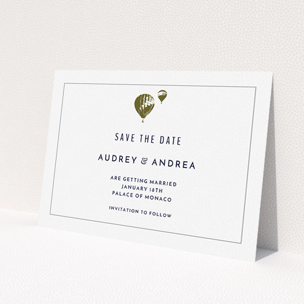 A wedding save the date card named 'Off and away'. It is an A5 card in a landscape orientation. 'Off and away' is available as a flat card, with mainly white colouring.