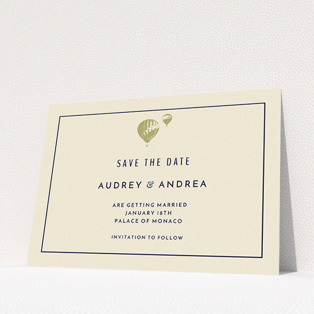 A wedding save the date card template titled "Off and away". It is an A5 card in a landscape orientation. "Off and away" is available as a flat card, with tones of cream and gold.