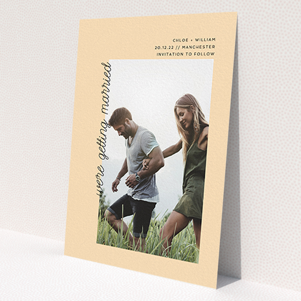 A wedding save the date card called 'Old Orange'. It is an A6 card in a portrait orientation. It is a photographic wedding save the date card with room for 1 photo. 'Old Orange' is available as a flat card, with mainly faded orange colouring.