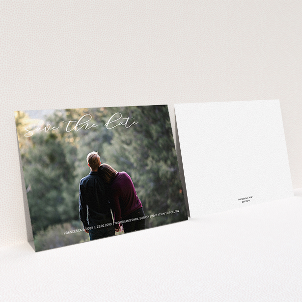 A wedding save the date card called "Photo Freedom". It is an A6 card in a landscape orientation. It is a photographic wedding save the date card with room for 1 photo. "Photo Freedom" is available as a flat card, with mainly white colouring.