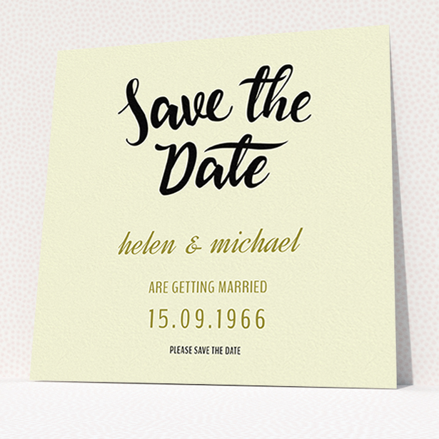 A wedding save the date card named "Simply Black Typography Pen". It is a square (148mm x 148mm) card in a square orientation. "Simply Black Typography Pen" is available as a flat card, with tones of cream, gold and black.