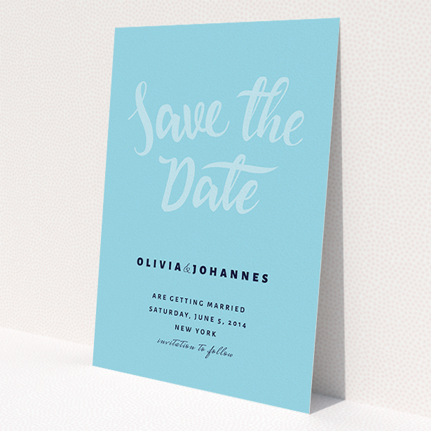 A wedding save the date card template titled 'Sky on Blue Typography'. It is an A5 card in a portrait orientation. 'Sky on Blue Typography' is available as a flat card, with mainly blue colouring.