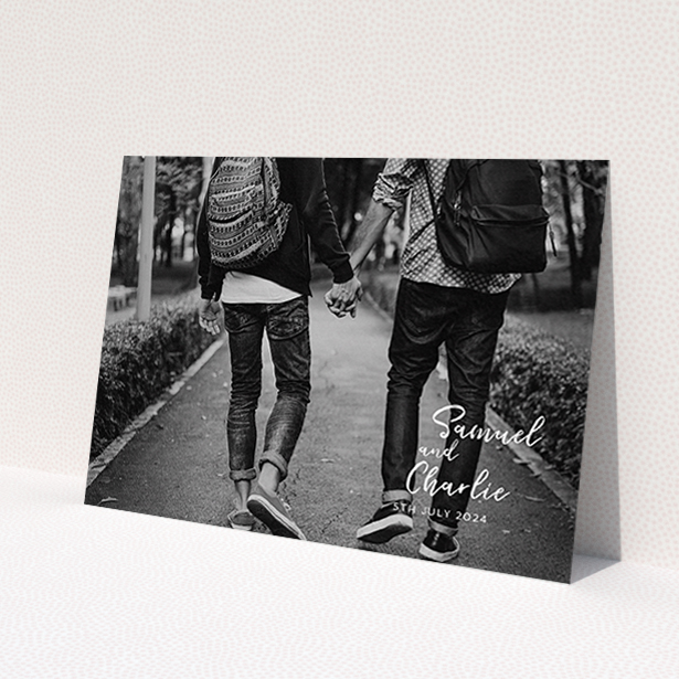 A wedding save the date card template titled 'Soho Script'. It is an A6 card in a landscape orientation. It is a photographic wedding save the date card with room for 1 photo. 'Soho Script' is available as a flat card, with mainly white colouring.