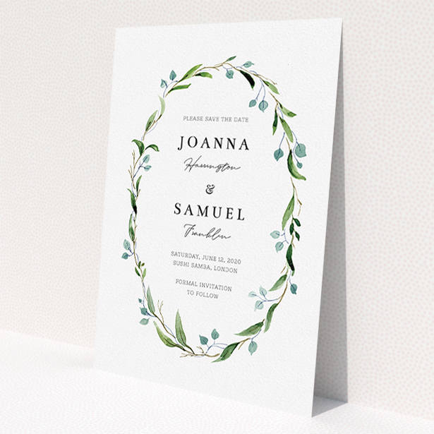 A wedding save the date card design named 'Thin Watercolour Wreath'. It is an A5 card in a portrait orientation. 'Thin Watercolour Wreath' is available as a flat card, with tones of blue and green.
