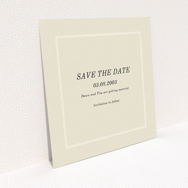 A wedding save the date card named "Three line border". It is a square (148mm x 148mm) card in a square orientation. "Three line border" is available as a flat card, with mainly dark cream colouring.