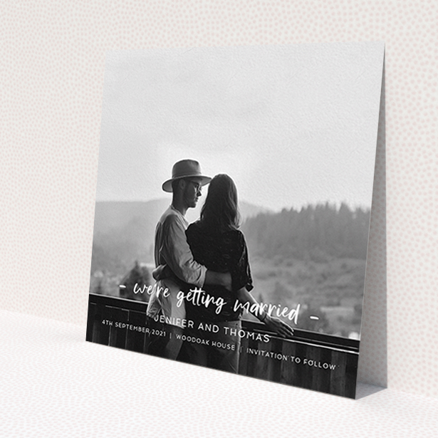 A wedding save the date card named 'To the Point'. It is a square (148mm x 148mm) card in a square orientation. It is a photographic wedding save the date card with room for 1 photo. 'To the Point' is available as a flat card, with mainly white colouring.