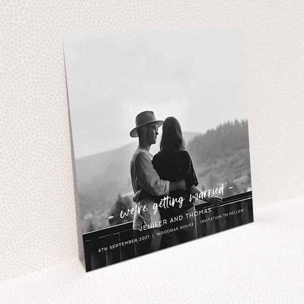 A wedding save the date card named "To the Point". It is a square (148mm x 148mm) card in a square orientation. It is a photographic wedding save the date card with room for 1 photo. "To the Point" is available as a flat card, with mainly white colouring.
