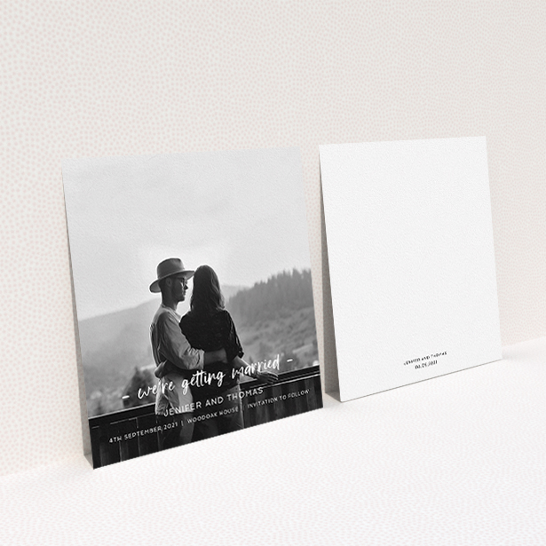 A wedding save the date card named "To the Point". It is a square (148mm x 148mm) card in a square orientation. It is a photographic wedding save the date card with room for 1 photo. "To the Point" is available as a flat card, with mainly white colouring.
