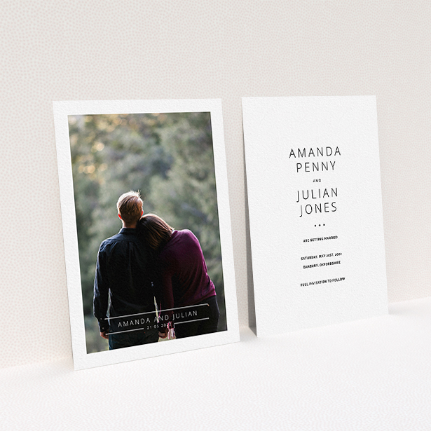 A wedding save the date card design called "Tramlines". It is an A6 card in a portrait orientation. It is a photographic wedding save the date card with room for 1 photo. "Tramlines" is available as a flat card, with mainly white colouring.