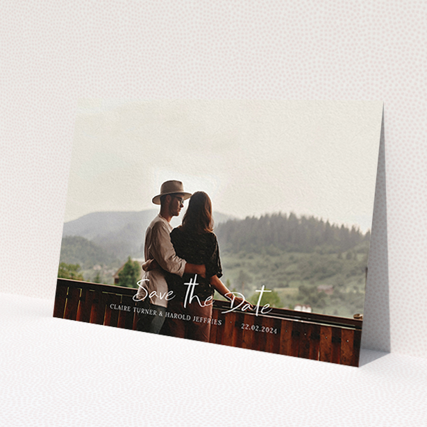 A wedding save the date named 'Central Script'. It is an A6 save the date in a landscape orientation. It is a photographic wedding save the date with room for 1 photo. 'Central Script' is available as a flat save the date, with mainly white colouring.