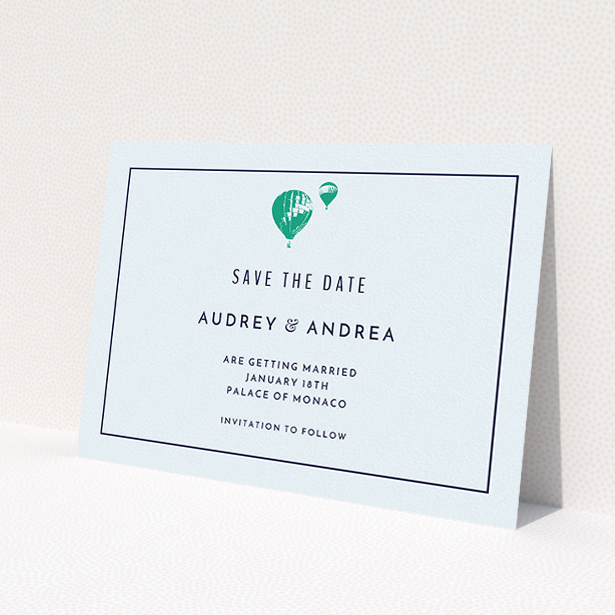 A wedding save the date design called 'Off and away'. It is an A5 save the date in a landscape orientation. 'Off and away' is available as a flat save the date, with mainly white colouring.