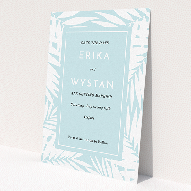 A wedding save the date template titled 'Pastel Jungle'. It is an A5 save the date in a portrait orientation. 'Pastel Jungle' is available as a flat save the date, with tones of blue and white.