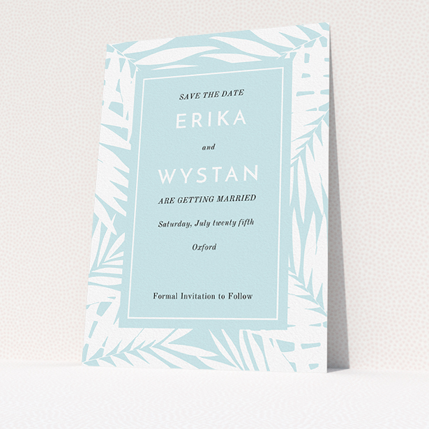 A wedding save the date template titled "Pastel Jungle". It is an A5 save the date in a portrait orientation. "Pastel Jungle" is available as a flat save the date, with tones of blue and white.