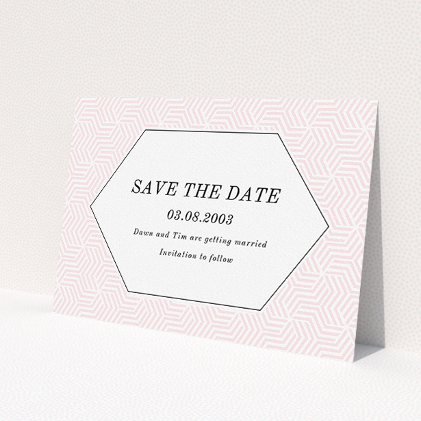 A wedding save the date called 'Pink geometric maze'. It is an A5 save the date in a landscape orientation. 'Pink geometric maze' is available as a flat save the date, with tones of pink and white.