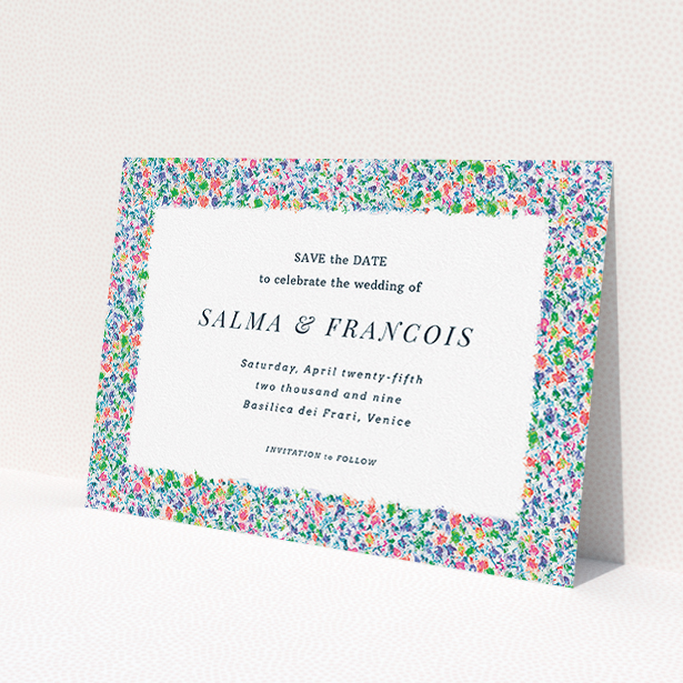 A wedding save the date named 'The faraway garden'. It is an A5 save the date in a landscape orientation. 'The faraway garden' is available as a flat save the date, with tones of white, blue and green.