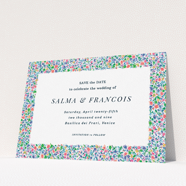 A wedding save the date named "The faraway garden". It is an A5 save the date in a landscape orientation. "The faraway garden" is available as a flat save the date, with tones of white, blue and green.