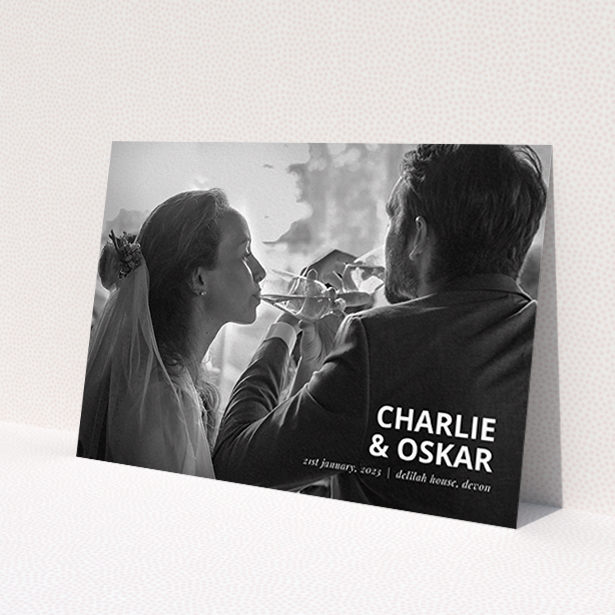 A wedding thank you card named 'Bold Photo Corner'. It is an A6 card in a landscape orientation. It is a photographic wedding thank you card with room for 1 photo. 'Bold Photo Corner' is available as a flat card, with mainly white colouring.