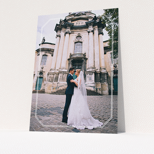 A wedding thank you card design called "Chiselled border". It is an A6 card in a portrait orientation. It is a photographic wedding thank you card with room for 1 photo. "Chiselled border" is available as a flat card, with mainly white colouring.