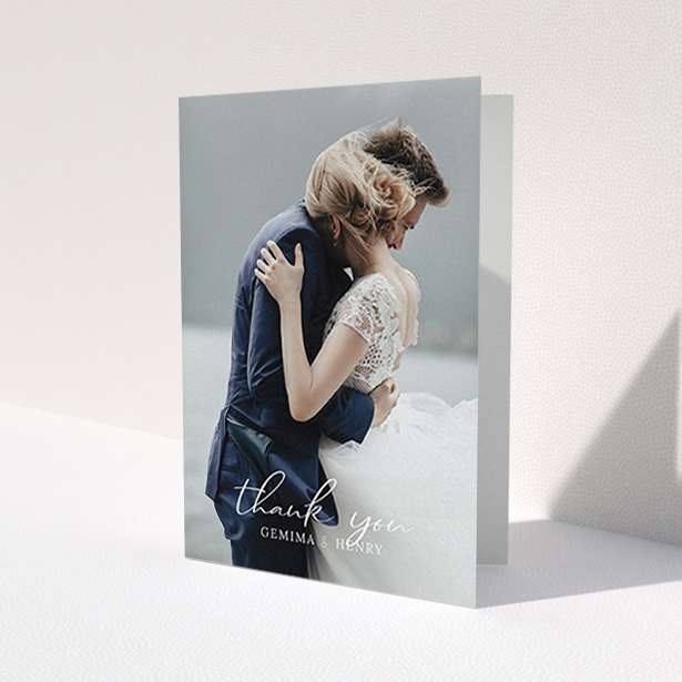 A wedding thank you card template titled 'Classic Thank You'. It is an A6 card in a portrait orientation. It is a photographic wedding thank you card with room for 1 photo. 'Classic Thank You' is available as a folded card, with mainly white colouring.