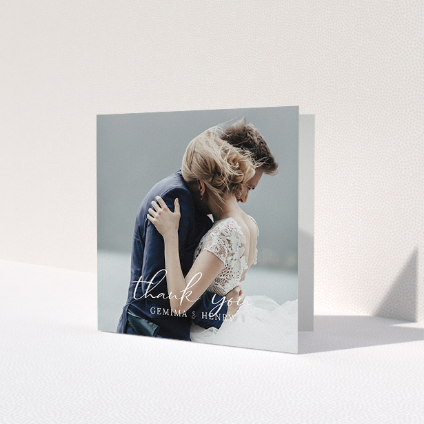 A wedding thank you card design named 'Classic Thank You'. It is a square (148mm x 148mm) card in a square orientation. It is a photographic wedding thank you card with room for 1 photo. 'Classic Thank You' is available as a folded card, with mainly white colouring.