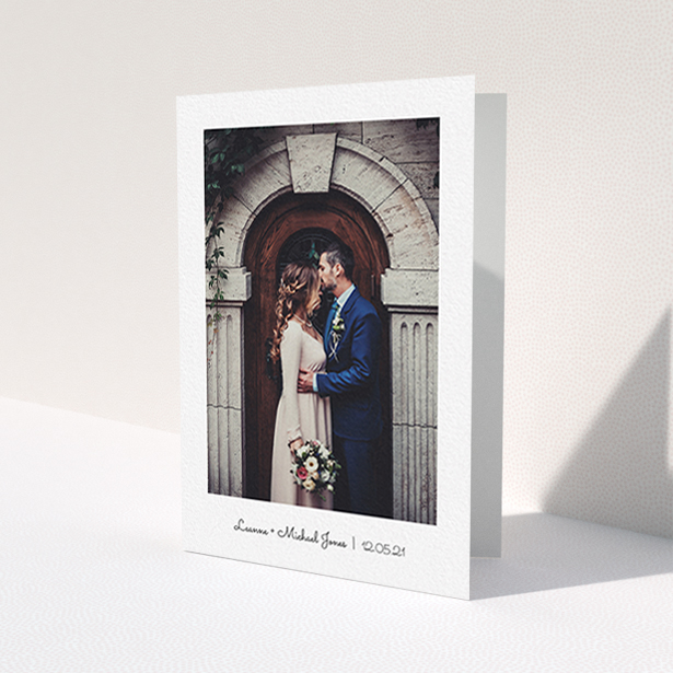 A wedding thank you card design named 'Classic Thank You with Photo'. It is an A6 card in a portrait orientation. It is a photographic wedding thank you card with room for 1 photo. 'Classic Thank You with Photo' is available as a folded card, with mainly white colouring.