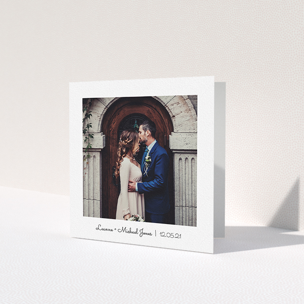 A wedding thank you card design called 'Classic Thank You with Photo'. It is a square (148mm x 148mm) card in a square orientation. It is a photographic wedding thank you card with room for 1 photo. 'Classic Thank You with Photo' is available as a folded card, with mainly white colouring.