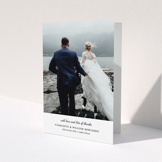 A wedding thank you card called 'Classic Wedding Thanks'. It is an A6 card in a portrait orientation. It is a photographic wedding thank you card with room for 1 photo. 'Classic Wedding Thanks' is available as a folded card, with mainly white colouring.