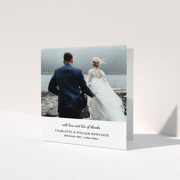 A wedding thank you card design called 'Classic Wedding Thanks'. It is a square (148mm x 148mm) card in a square orientation. It is a photographic wedding thank you card with room for 1 photo. 'Classic Wedding Thanks' is available as a folded card, with mainly white colouring.