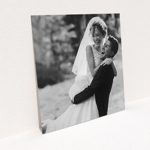 A wedding thank you card named "Full-page portrait". It is a square (148mm x 148mm) card in a square orientation. It is a photographic wedding thank you card with room for 1 photo. "Full-page portrait" is available as a flat card.