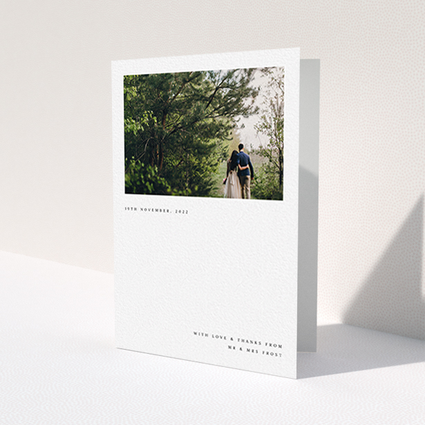 A wedding thank you card design titled 'Modern Postcard'. It is an A6 card in a portrait orientation. It is a photographic wedding thank you card with room for 1 photo. 'Modern Postcard' is available as a folded card, with mainly white colouring.