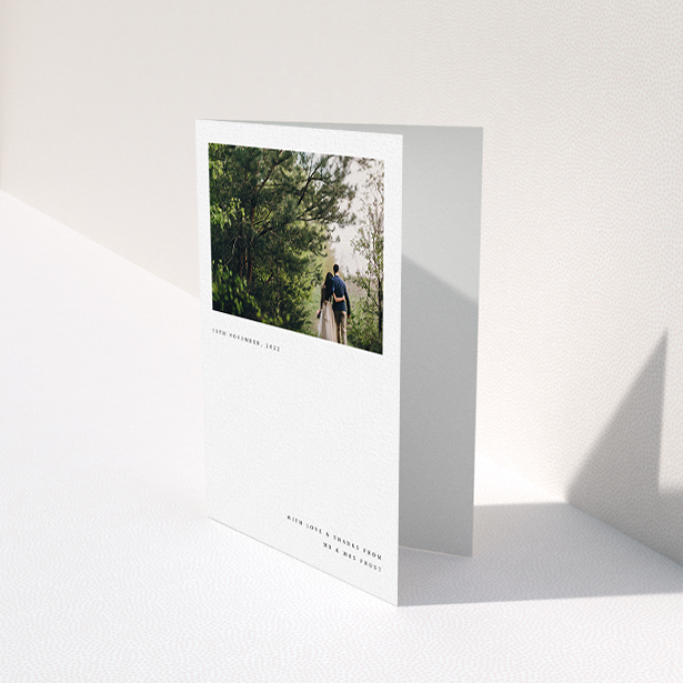 A wedding thank you card design titled "Modern Postcard". It is an A6 card in a portrait orientation. It is a photographic wedding thank you card with room for 1 photo. "Modern Postcard" is available as a folded card, with mainly white colouring.