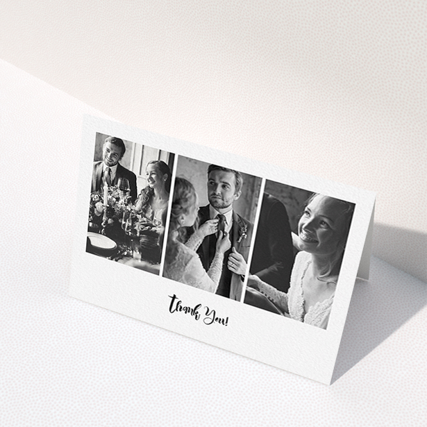 A wedding thank you card named "Modern Tryptic". It is an A6 card in a landscape orientation. It is a photographic wedding thank you card with room for 3 photos. "Modern Tryptic" is available as a folded card, with mainly white colouring.